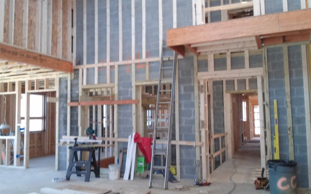 in living room, looking toward atrium and 3rd floor balcony